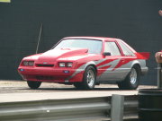 Red and Silver Mustang Drag Car